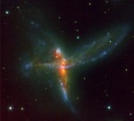 Colliding galaxies form Tinkerbell in space.